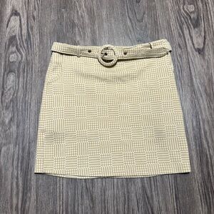 Plaid belted mini skirt in size S and it has pockets! Super cute & flattering.